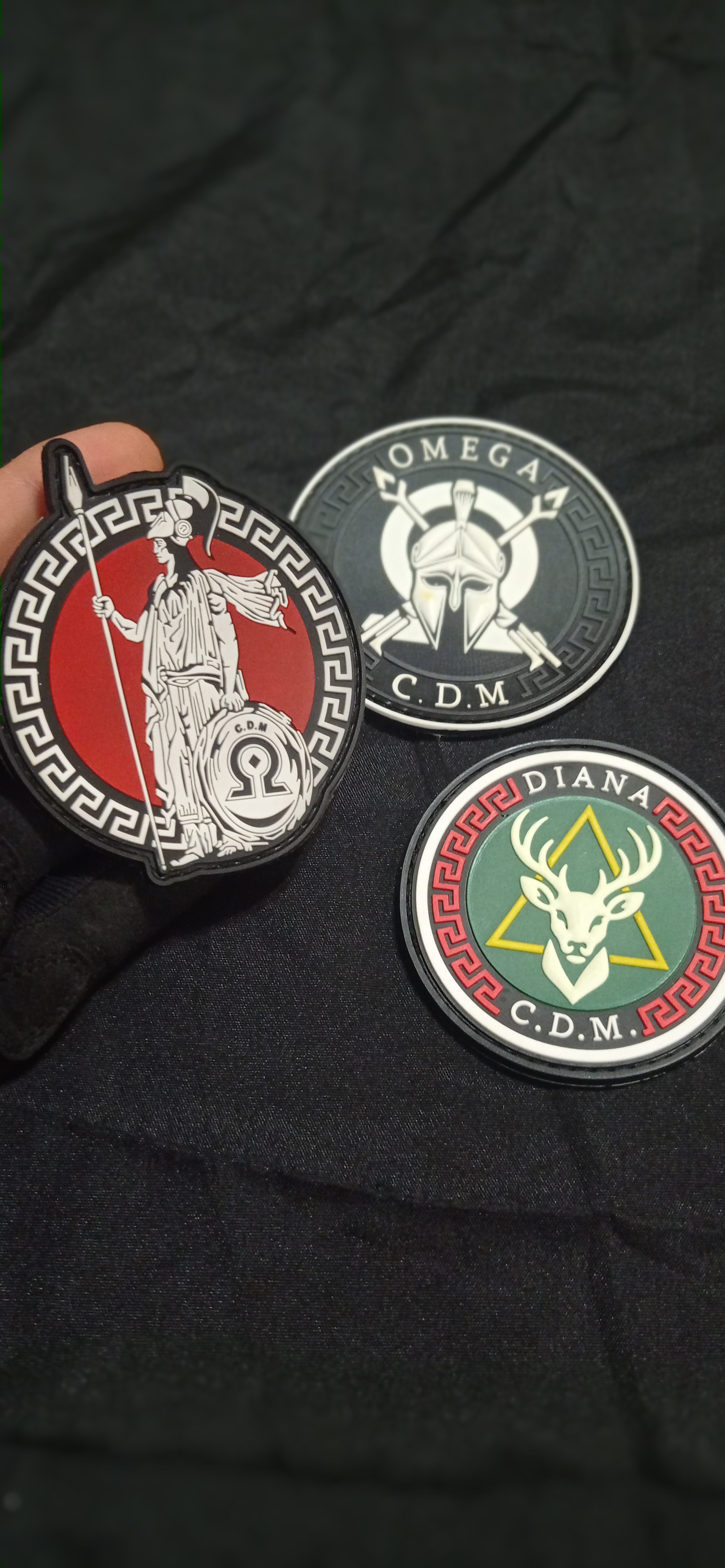 C.D.M.